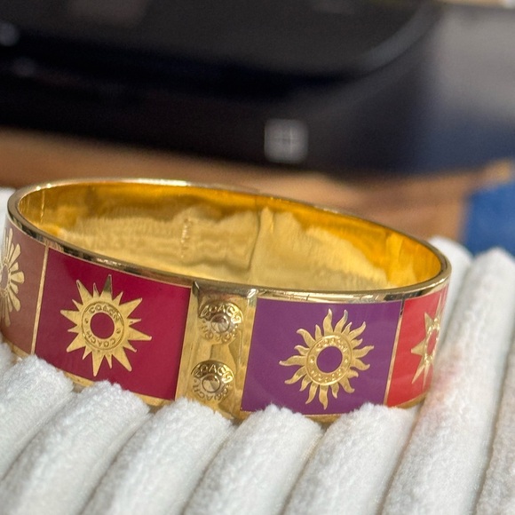 533. Coach Limited Tony Duquette Sunburst Gold Bangle. Measures 7.5”. - Picture 2 of 5